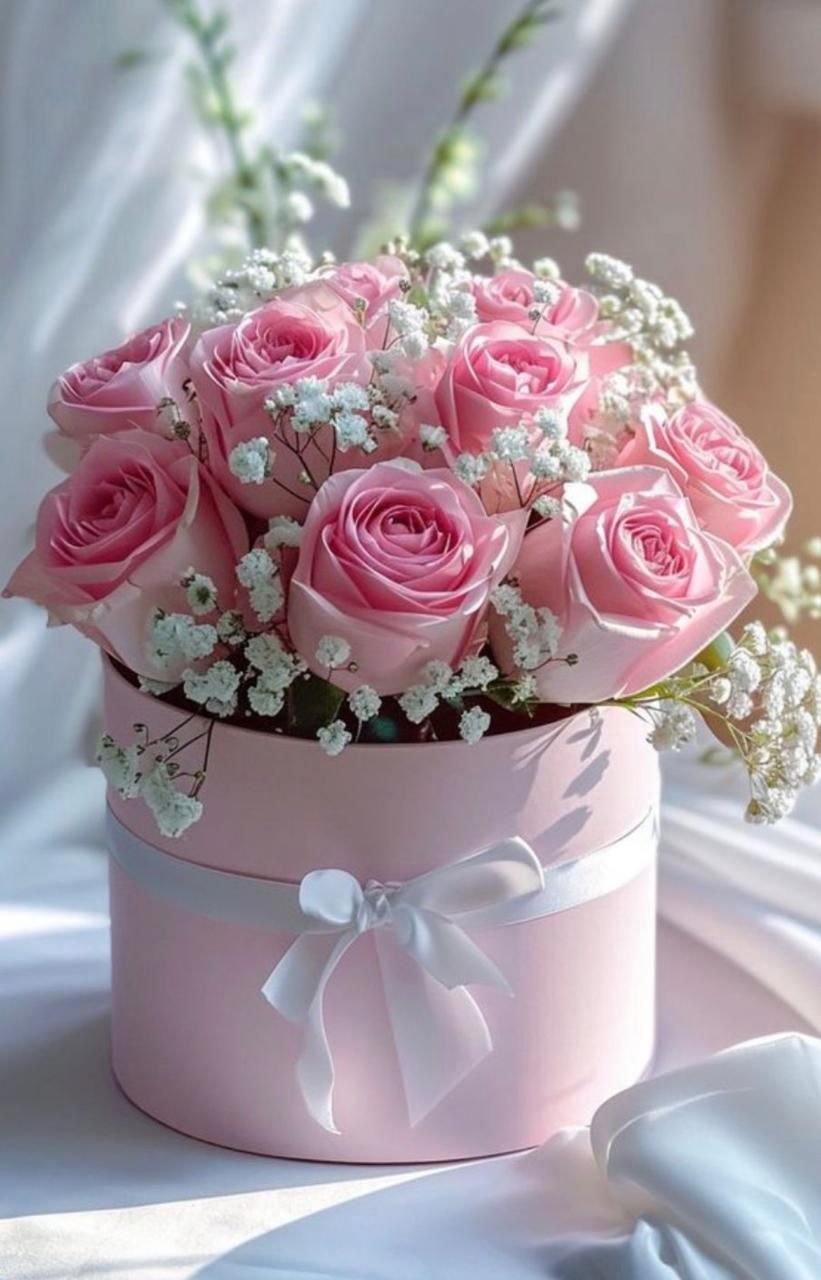 Pink round box with pink roses & gypso